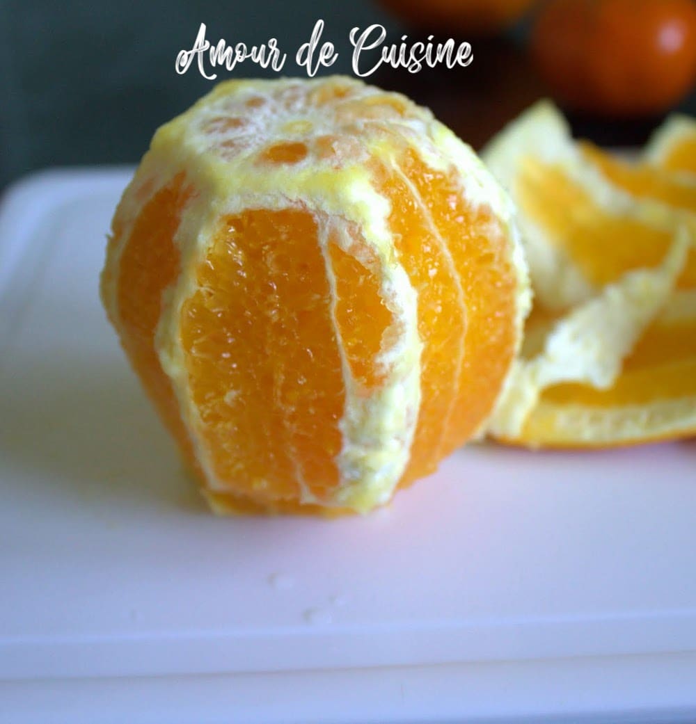 Orange peler à vif pour preparer la confiture d-oranges