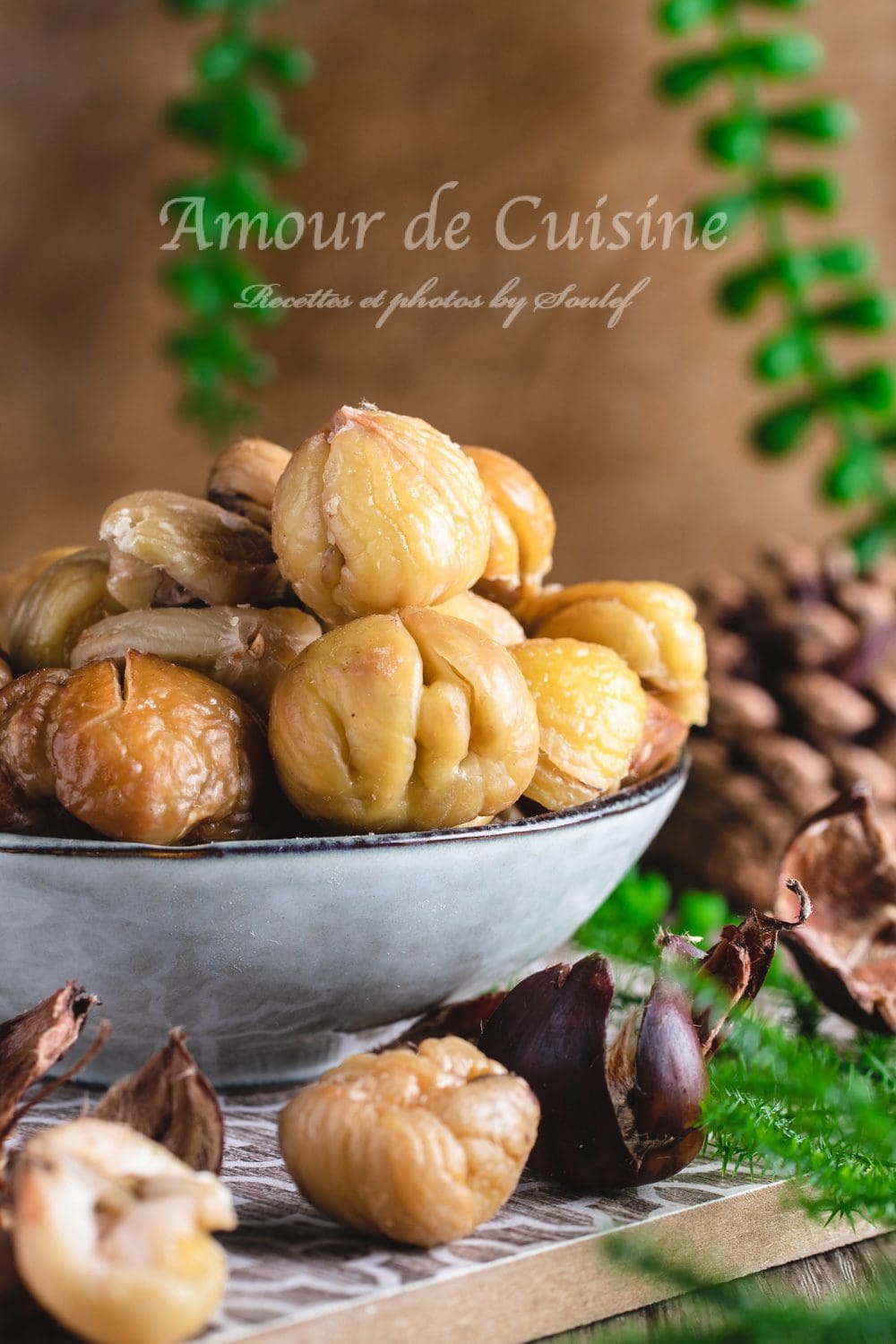Bowl of boiled chestnuts, tender and peeled, placed on a rustic table with chestnut shells and pinecones, in a warm autumn atmosphere